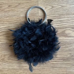 Black feathered handbag